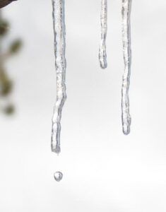 icicles hanging from the bay window at Ginty Creek