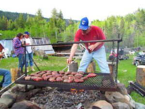 Lee Taylor barbecueing steaks