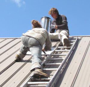 repairing a chimney at Nuk Tessli