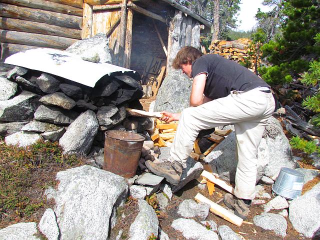 lighting the fire in Nuk Tessli's outdoor stone oven 