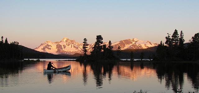 Sam canoeing at sunrise