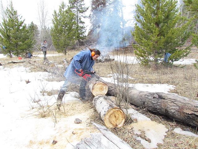 Anne operating chainsaw