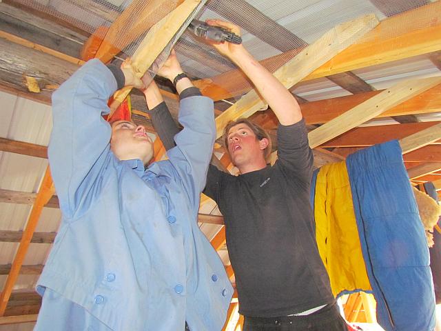 Anne and Sam preparing to insulate the attic