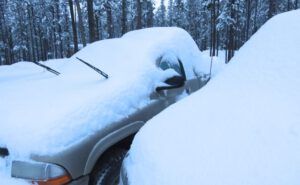 13 vehicles snowed in