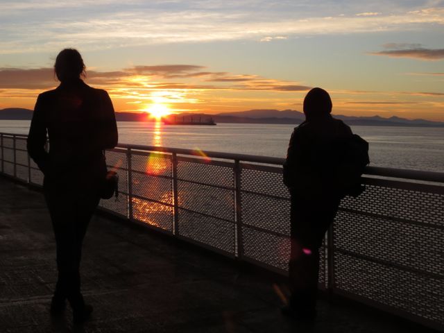 25 sun setting on ferry